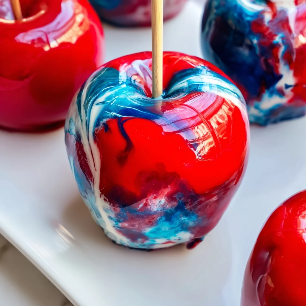 Visually impaired users can imagine crisp apples dipped in a hard, sweet shell with vibrant marbled colors.