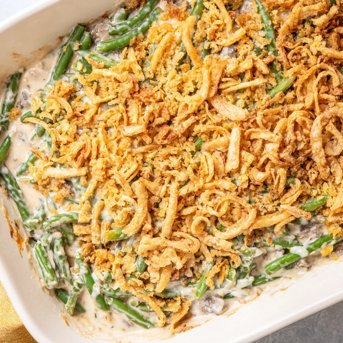 Creamy green bean casserole topped with crispy crushed Ritz crackers fresh from the oven