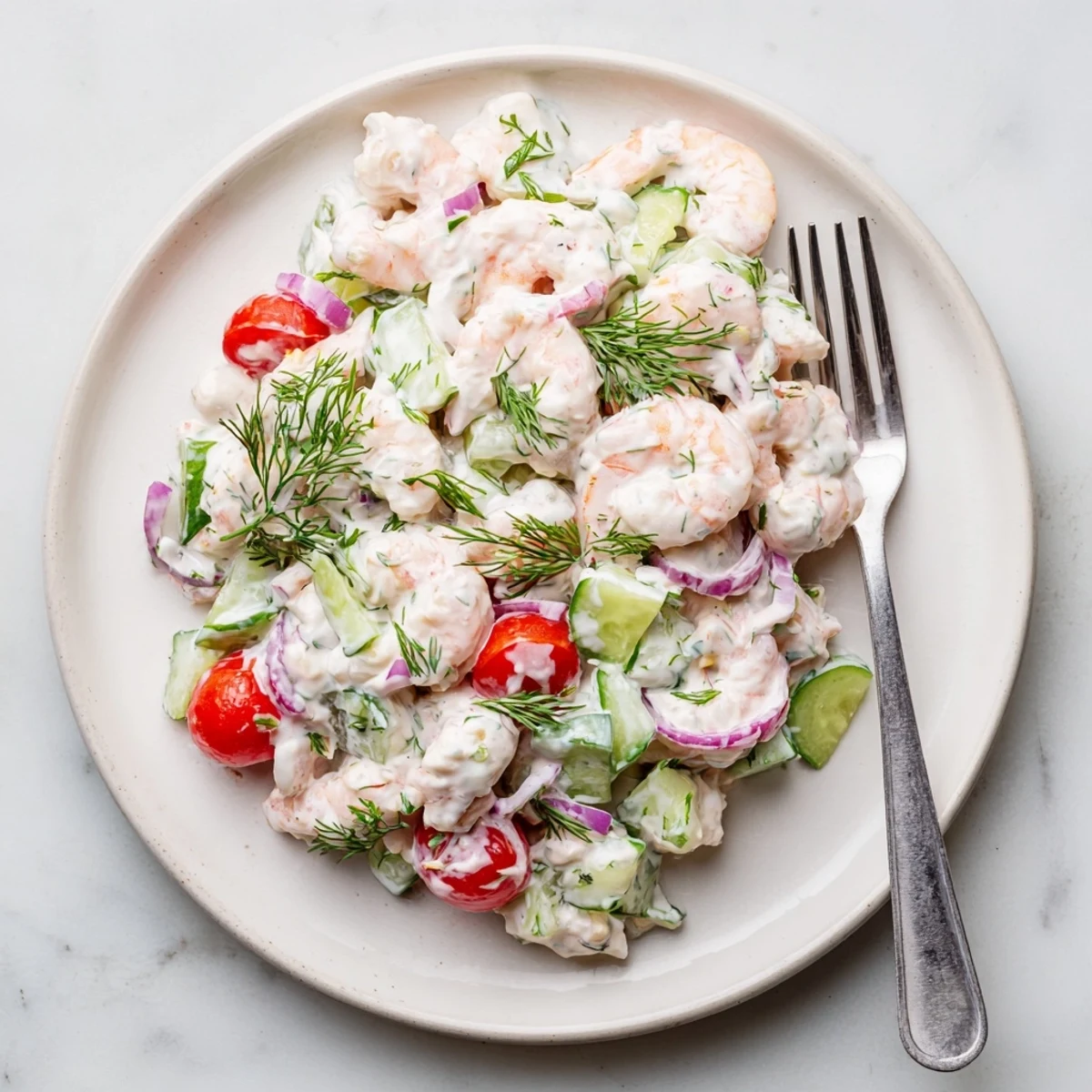 Easy shrimp salad recipe in a bowl with zesty Dijon dressing and celery