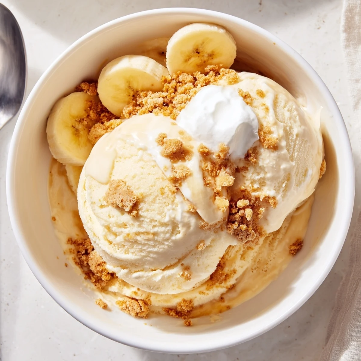 Silky banana custard churned in Ninja Creami Banana Cream Pie Ice Cream