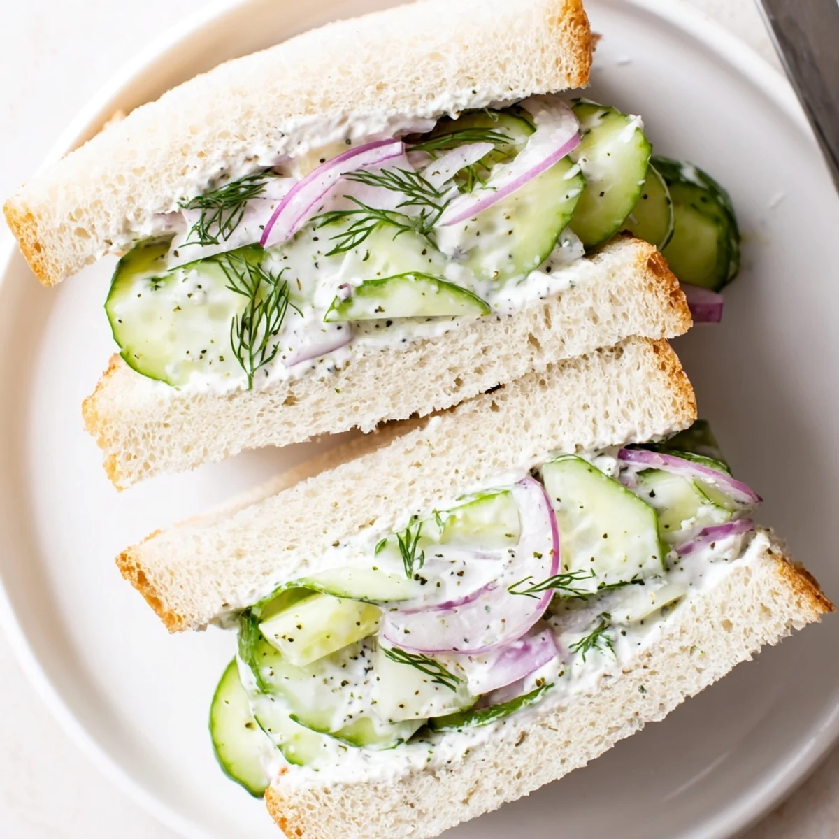 Tea-ready Quick Cucumber Salad Sandwiches, buttered bread, lemony yogurt dressing and dill